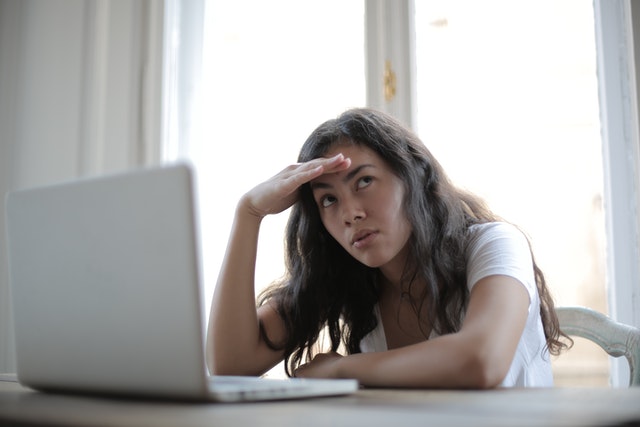 stressed woman on computer